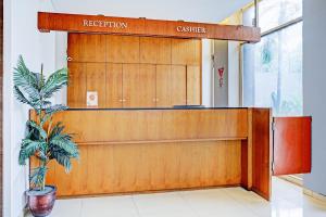 Ο χώρος του λόμπι ή της ρεσεψιόν στο Capital O 94725 Montameri Pelajar Pejuang