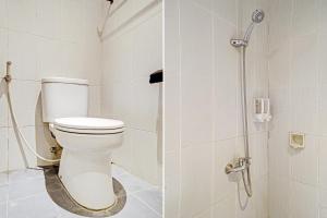 Ένα μπάνιο στο Capital O 94725 Montameri Pelajar Pejuang +31 φωτογραφίες