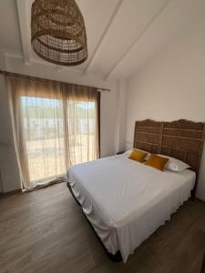 Postel nebo postele na pokoji v ubytování Corona beach + 28 fotografií