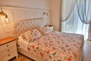 Postel nebo postele na pokoji v ubytování Le Radici