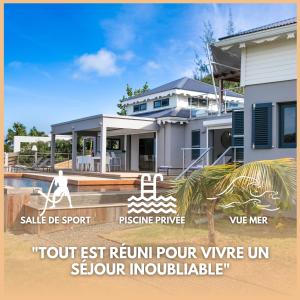 a house with a sign in front of it at Villa Zabrico - Villa de Prestige - Vue Mer & Lagon 180 - Idéal Groupe x14 - Vacances & Team Building - Salle de Sport - Piscine Privée - Climatisation - Jardin - Terrasse - Barbecue - Pétanque - 10min Plages - Service PREMIUM in Cul de Sac