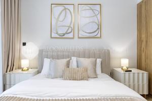 Katil atau katil-katil dalam bilik di Bloomfields Iconic 1Br In Al Maryah Island +7 gambar