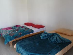 Ένα ή περισσότερα κρεβάτια σε δωμάτιο στο sahara beach camp