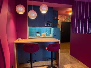 O bucătărie sau chicinetă la Apartament Disco Szczytno
