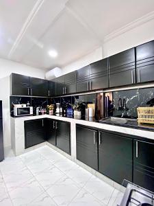 Kuchyň nebo kuchyňský kout v ubytování Appartement des Lys + 13 fotografií