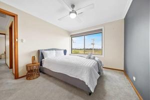 Ένα ή περισσότερα κρεβάτια σε δωμάτιο στο Spacious Family Retreat