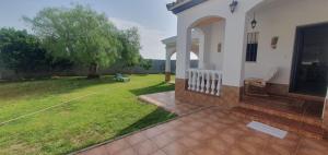 Κήπος έξω από το Casa con jardin privado en primera linea de playa