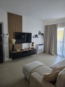 Et tv og/eller underholdning på Cavalo Preto Luxury Beach Resort - C201