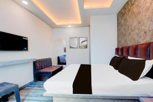 TV a/nebo společenská místnost v ubytování Hotel Alpine