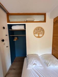 Postel nebo postele na pokoji v ubytování La cime de Valmi - A deux pas du front de neige + 11 fotografií