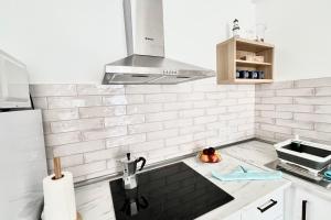 Dapur atau dapur kecil di Casa Burgao 1 on front line opposite natural pools +9 gambar