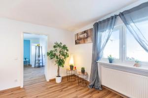Ένα ή περισσότερα κρεβάτια σε δωμάτιο στο Pr-Ferienwohnung