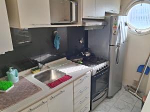 Η κουζίνα ή μικρή κουζίνα στο 2 amb peatonal