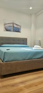 Postel nebo postele na pokoji v ubytování Casa vacanze Fiorenza