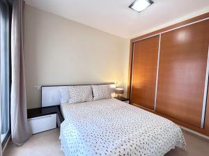 Postel nebo postele na pokoji v ubytování Denia Nature Apartment