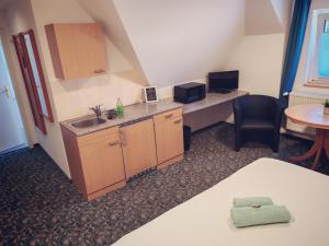 Μια τηλεόραση ή/και κέντρο ψυχαγωγίας στο Domstadt Apartments