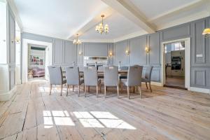 a dining room with a table and chairs at 6 Angel Hill, Bury st Edmunds in Bury Saint Edmunds