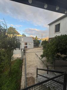 a view of a building with a driveway at Tsikhisdziri Home in Ts'ikhisdziri +8 photos