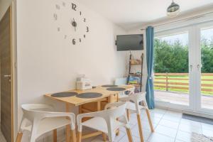 TV a/nebo společenská místnost v ubytování Résidence Le Printemps - Appt vue montagne + 7 fotografií