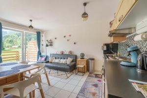 Kuchyň nebo kuchyňský kout v ubytování Résidence Le Printemps - Appt vue montagne