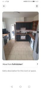 a kitchen with a unintention at Beaconsfield Square in Hartlepool