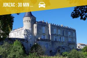 an image of a castle with a car on top at Le Cosy, Calme, parking, centre Gémozac in Gémozac