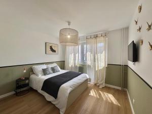 Postel nebo postele na pokoji v ubytování M121 Marquer Grand T4 moderne et chic