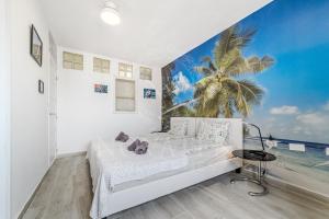 Postel nebo postele na pokoji v ubytování Casa Brisa Del Mar