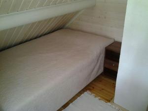 Katil atau katil-katil dalam bilik di Convenient Apartment for 6 with Sauna