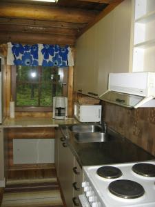 Dapur atau dapur kecil di Practical Apartment for 6 with Sauna