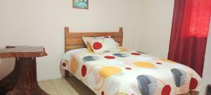 Ένα ή περισσότερα κρεβάτια σε δωμάτιο στο Casa El Guayacan