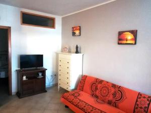 TV a/nebo společenská místnost v ubytování The Pearl of sea - La Perla del mare