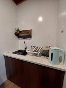 Kuchyň nebo kuchyňský kout v ubytování Villa Saung Wira