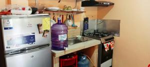 Η κουζίνα ή μικρή κουζίνα στο Casa El Guayacan +12 φωτογραφίες