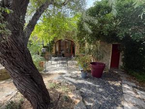 Κήπος έξω από το Moulin AURELIA - chambre La Coloniale