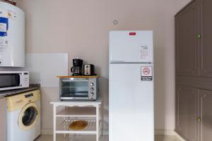 Η κουζίνα ή μικρή κουζίνα στο Céntrico, Espacioso y Muy Bien Equipado: "Tu Hogar Temporal en la Ciudad de Mendoza" +18 φωτογραφίες