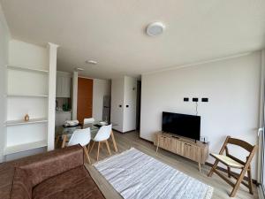 TV a/nebo společenská místnost v ubytování Depto La Serena