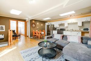 a living room with a couch and a table at COZY 2 Bedroom in Montréal