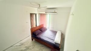 Postel nebo postele na pokoji v ubytování S ROOMs + 7 fotografií