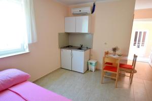 Kuchyň nebo kuchyňský kout v ubytování Apartment Jamb