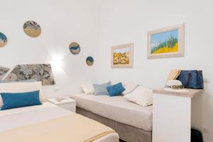 Ένα ή περισσότερα κρεβάτια σε δωμάτιο στο Clio Rome Suite 2 bedroom 2 bathroom apartment