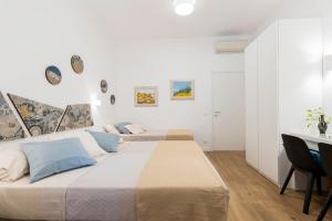 Ένα ή περισσότερα κρεβάτια σε δωμάτιο στο Clio Rome Suite 2 bedroom 2 bathroom apartment +12 φωτογραφίες