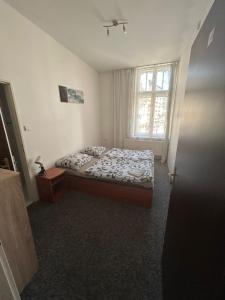 Кровать или кровати в номере U malého náměstí Ostrava Centrum +13 фотографий