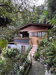 a house with a staircase leading up to it at Casa da Oma in Blumenau