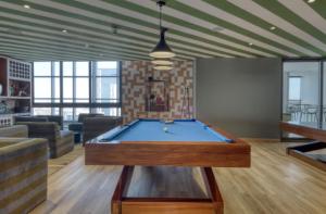 a living room with a pool table in it at Pet-friendly Furnished 1BR Rental in Mexico City in Mexico City