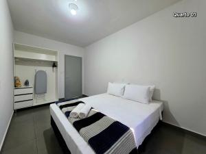 Voodi või voodid majutusasutuse Casa 01 com 2 quartos, churrasqueira 15min centro toas