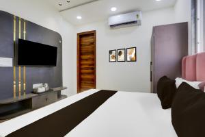 Μια τηλεόραση ή/και κέντρο ψυχαγωγίας στο Hotel O Sukun Villa