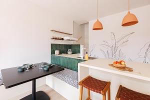 Kuchyň nebo kuchyňský kout v ubytování L Ecrin d Ailleurs