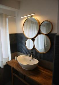 Photo de la galerie de l'établissement Libeccio Apartment, Rosa dei Venti, Perla Marina, à Forte Village