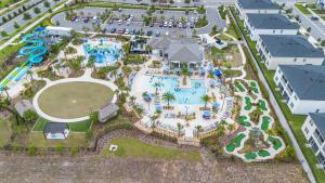 an overhead view of a pool at a resort at Paradise Home 20 Mins to Disney with Pool and Waterpark on Property in Abbeyville